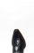 Cuadra Boots en cuir de jambe d'autruche de couleur noir brillant